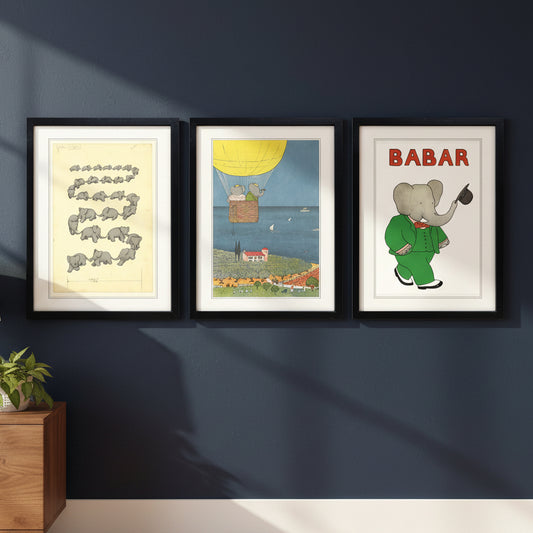 Three framed art prints displayed side-by-side against a white background. The left print features a vintage-style animal sequence illustration of elephants on a cream background.