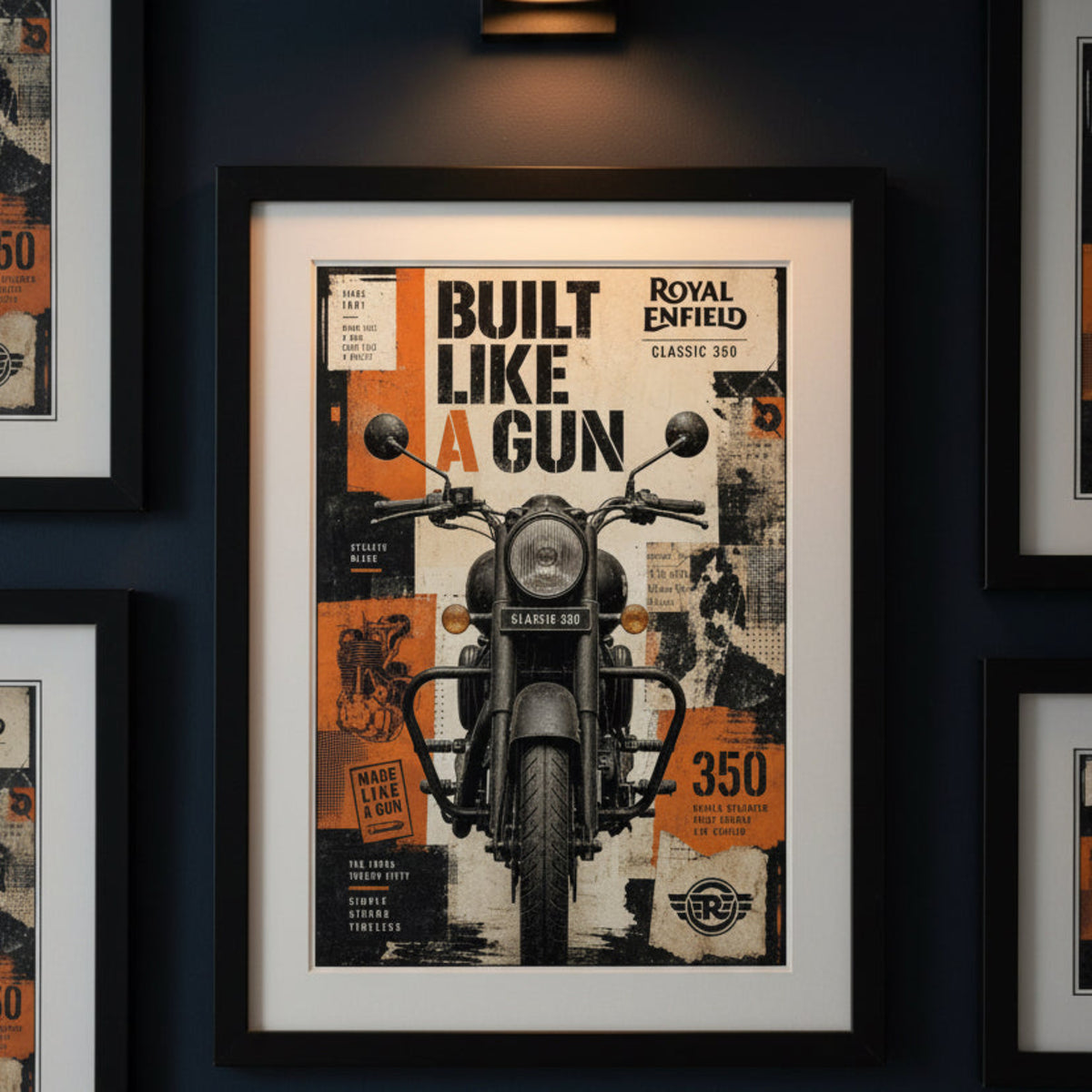 A framed wall art print featuring a vintage Royal Enfield motorcycle poster, hung on a dark navy wall. The poster has a black frame, white mat, and an orange, black, and white collage design with the text 'BUILT LIKE A GUN' and 'ROYAL ENFIELD'.