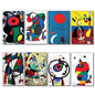 Set of 8 vintage Joan Miró fridge magnets featuring surrealist Spanish art, showcasing colorful abstract paintings.