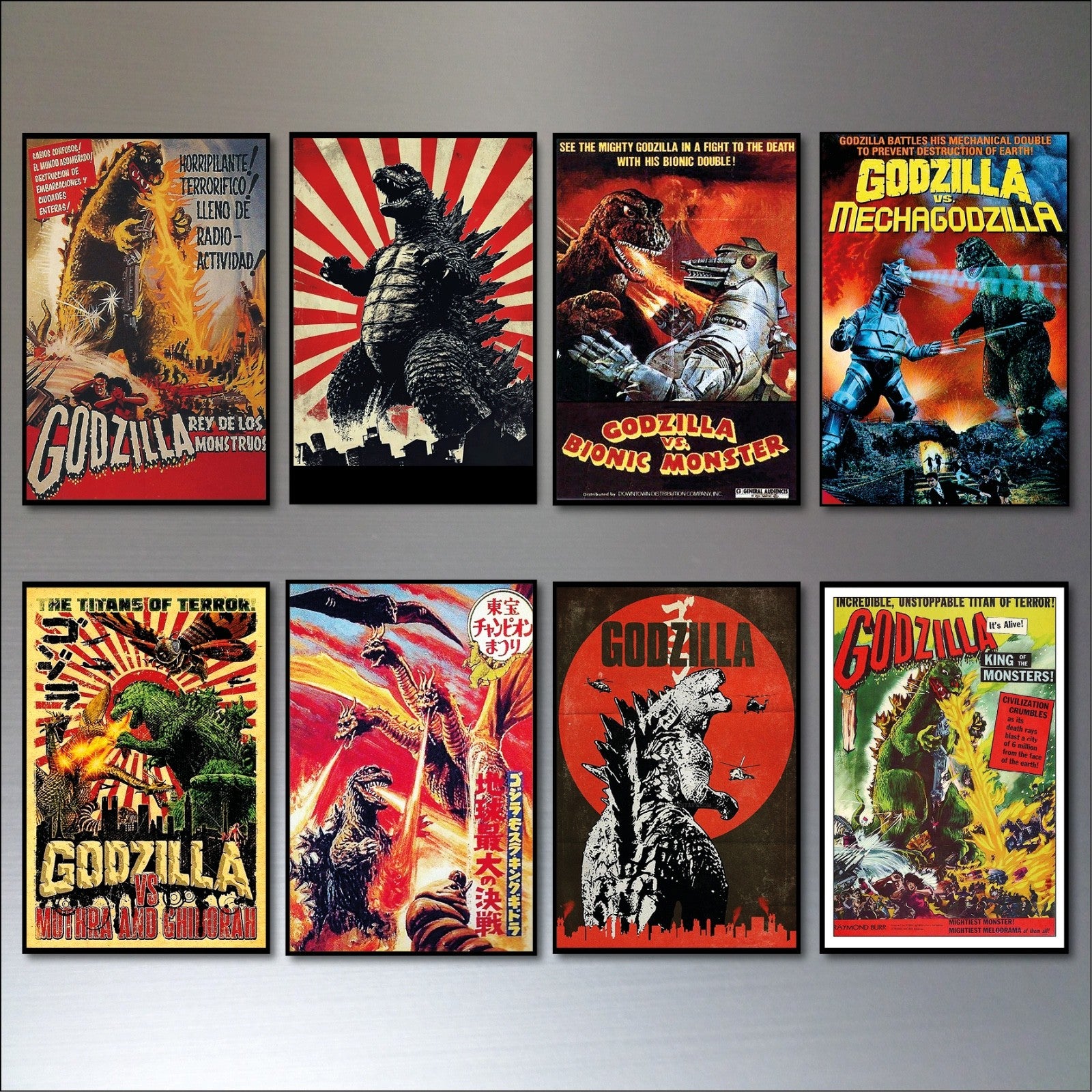 Set of 8 vintage Godzilla film poster fridge magnets with colorful monster images and classic movie artwork.