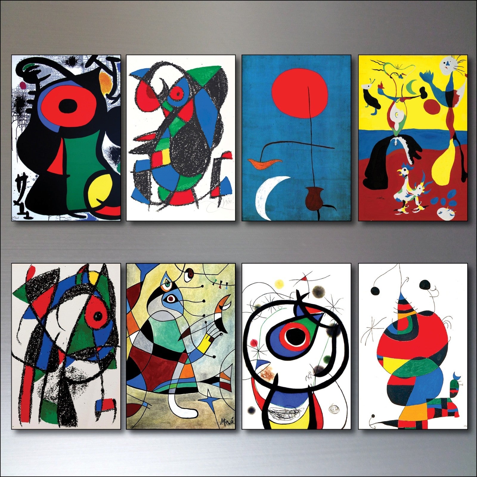 Set of 8 vintage Joan Miró surrealist fridge magnets featuring colorful Spanish art designs.