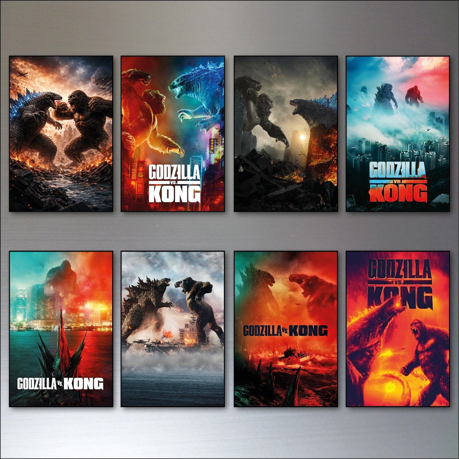 Set of 8 fridge magnets featuring Godzilla vs King Kong film poster designs, collectible movie poster magnets collection.