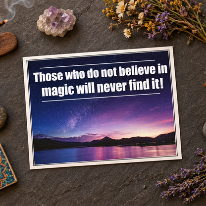 A motivational quote reading 'Those who do not believe in magic will never find it!' in bold white text over a starry night sky and mountain landscape.