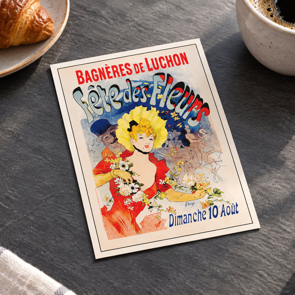 A vintage French advertising poster for 'Bagnères de Luchon - Fête des Fleurs' displayed against a neutral gray gradient background. The poster features a colorful illustration of a woman in a red dress and yellow hat, a man in a top hat, and floral elements, with bold red and blue lettering.