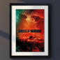 Framed wall art poster featuring a dramatic Godzilla vs Kong battle scene, with Godzilla on the left in dark teal tones and Kong on the right in fiery red-orange tones, shown in a black frame with white mat on a light gray background.
