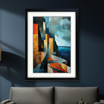 A framed abstract coastal landscape art print featuring geometric cliffs, stairways, and water in blue, teal, orange, and brown tones, presented in a black frame with a white mat on a light gray background.