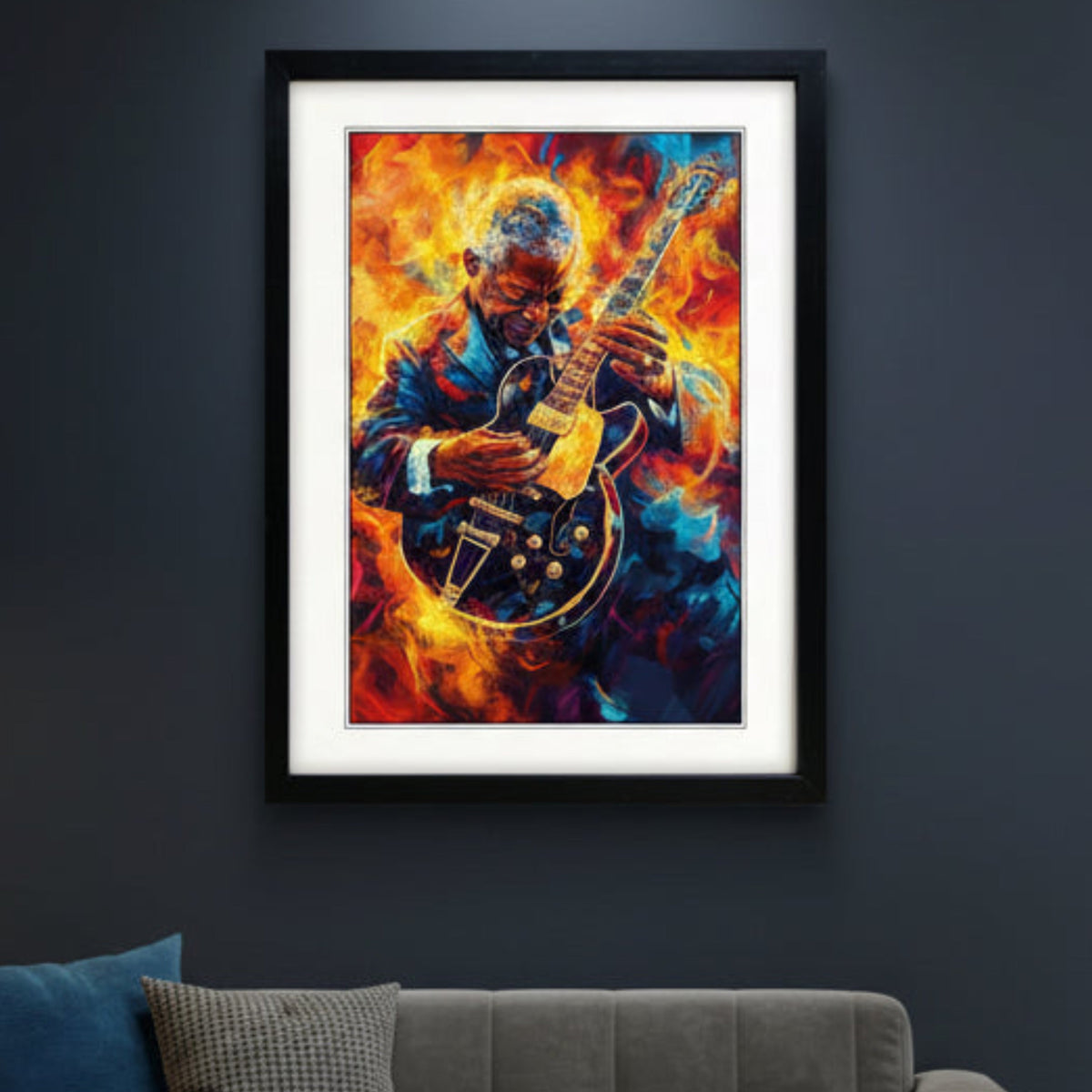 Framed wall art featuring a stylized, fiery portrait of B.B King an electric guitar, shown in a black frame with a white mat against a light Blue background.