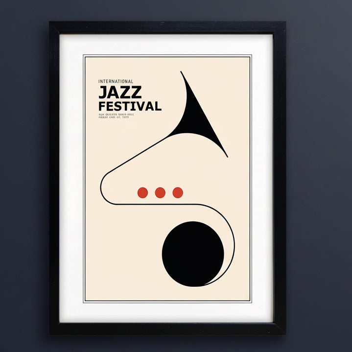 Framed minimalist jazz poster featuring a stylized tuba illustration with the text 'International Jazz Festival' on a cream background, enclosed in a black frame.