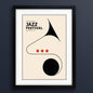 Framed minimalist jazz poster featuring a stylized tuba illustration with the text 'International Jazz Festival' on a cream background, enclosed in a black frame.