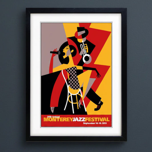 Framed art print featuring a stylized jazz festival illustration with two musicians in bold geometric shapes. The print includes the text '54th Annual Monterey Jazz Festival September 16-18, 2011' at the bottom.
