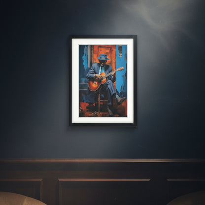 Framed wall art featuring a stylized painting of robert Johnson in a blue suit and hat playing an acoustic guitar, set against a vivid blue and orange background. The artwork is matted with a white border and enclosed in a black frame, shown on a plain white background.