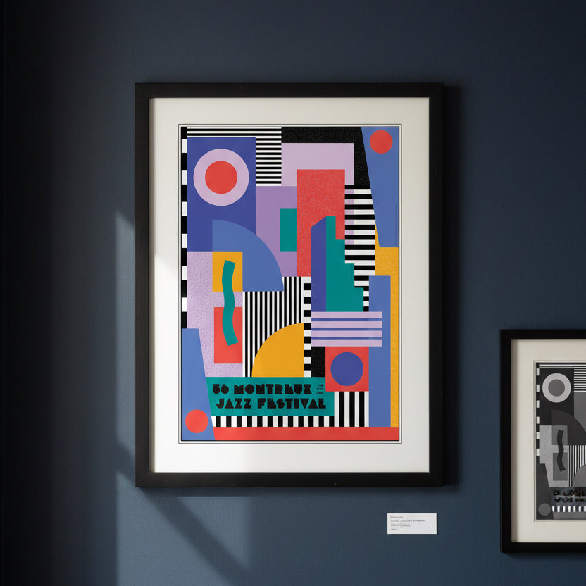 Framed abstract art print featuring a colorful geometric design with the text '66 MONTREUX JAZZ FESTIVAL' at the bottom, shown in a black frame against a white background.