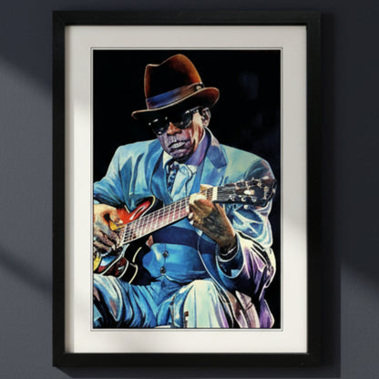 Framed pop-art print of blues musician JOHN Lee Hooker. The picture is in a back frame on a blue wall. The print is a painting style.