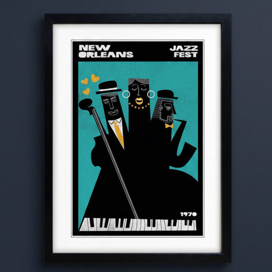 Framed art print featuring a stylized New Orleans Jazz Fest illustration with three black silhouetted figures against a teal background, shown in a black frame with white matting.