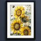 Framed wall art featuring three large yellow sunflowers with green leaves and small bumblebees on a vintage-style beige background, shown in a black frame with white matting.