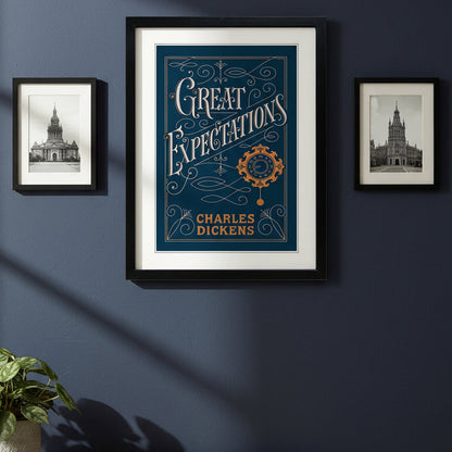 Framed art print of Charles Dickens' 'Great Expectations' featuring a dark navy blue background with ornate silver lettering and gold decorative details, enclosed in a black frame with a white mat.