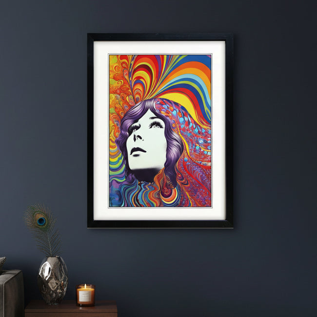 A framed psychedelic art print featuring a stylized portrait of a woman with flowing multicolored hair and swirling rainbow patterns, presented in a black frame with a white mat against a light gray background.