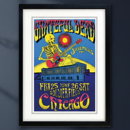 A framed Grateful Dead concert poster featuring a skeleton playing a red guitar under a yellow sun, with text reading 'Grateful Dead', 'Steve Miller', and 'Chicago' on a white background.