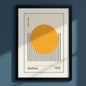 Bauhaus print on blue wall in black frame with white mount