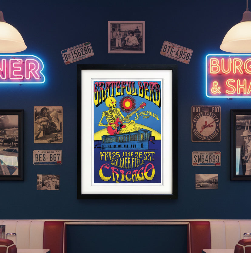 A framed Grateful Dead concert poster featuring a skeleton playing a red guitar under a yellow sun, with text reading 'Grateful Dead', 'Steve Miller', and 'Chicago' on a white background.