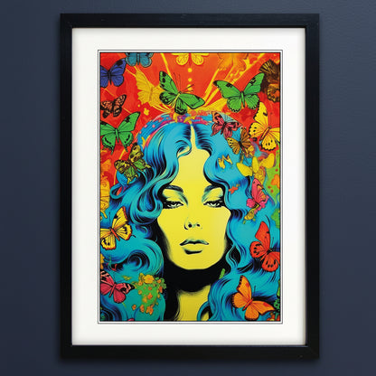 A framed pop art print featuring a stylized woman's face with bright blue hair surrounded by colorful butterflies on a vivid orange and yellow background, presented in a black frame with a white mat.