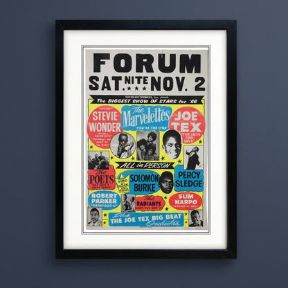Solomon Burke, stevie wonder, Joe tex, Percy sledge vintage gig poster hung on blue wall 
