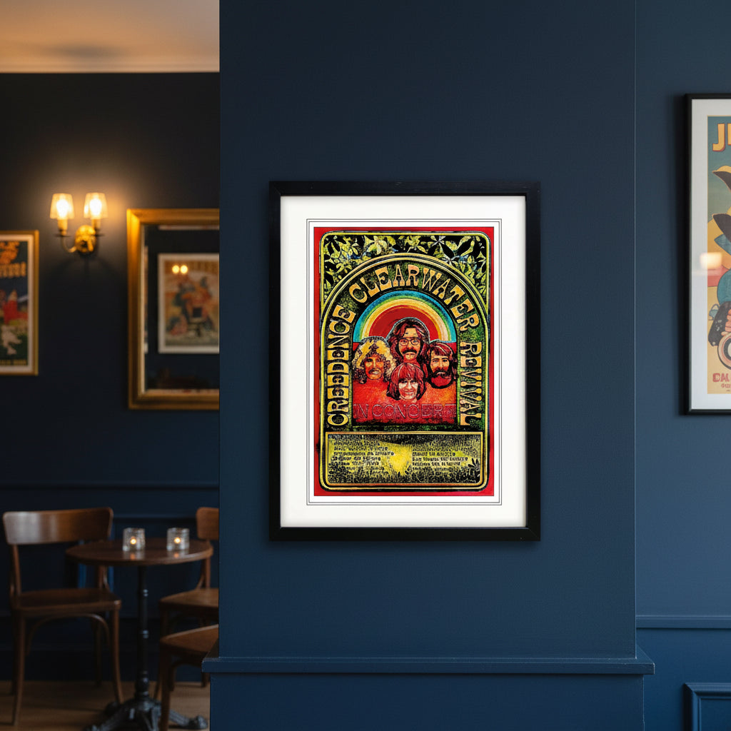 A framed concert poster for the band Credence Clearwater Revival, featuring a colorful psychedelic design with the band members' faces and a rainbow arch, presented in a black frame with white matting.