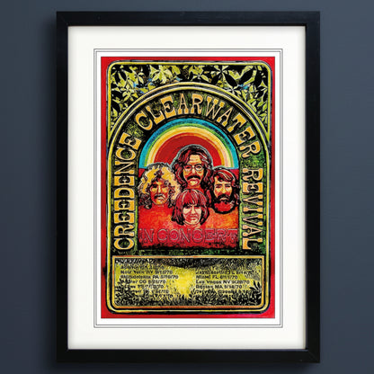 A framed psychedelic concert poster for the band Creedence Clearwater Revival, featuring a vibrant rainbow arch, stylized portraits of the band members, and green leafy patterns, presented in a black frame with a white mat.