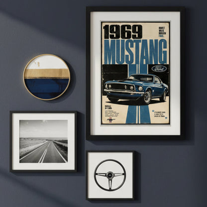 A framed vintage-style Ford Mustang poster print featuring a blue 1969 Mustang car with large '1969 MUSTANG' text and the Ford logo, shown against a white background.