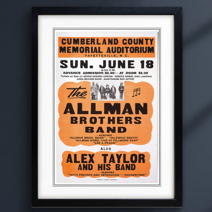 This all spam brothers and also Alex Taylor and his band vintage gig promotion poster print in black frame on a dark blue wall 