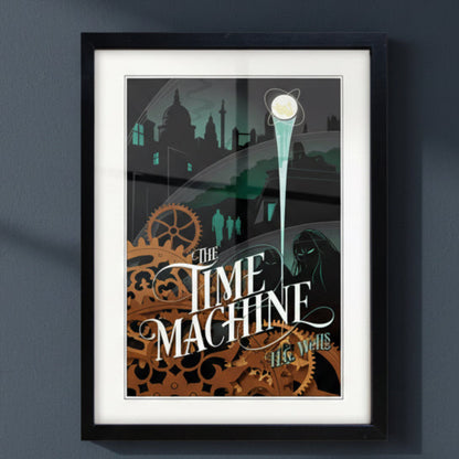 A framed art print of H.G. Wells Time Machine book cover in a black frame on a white wall.