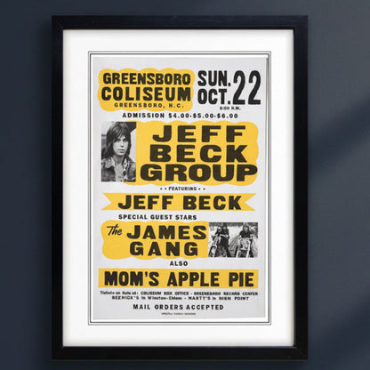 A framed vintage concert poster for Jeff Beck Group and The James Gang, displayed against a dark gray wall. The poster features bold yellow and black text on a grey background with black frames.