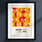 A framed Bauhaus poster featuring a bold mid-century geometric pattern in orange, yellow, and red, with the text 'BAUHAUS RUSSELLING JULY-SEPTEMBER 1923' below, shown in a black frame against a white background.