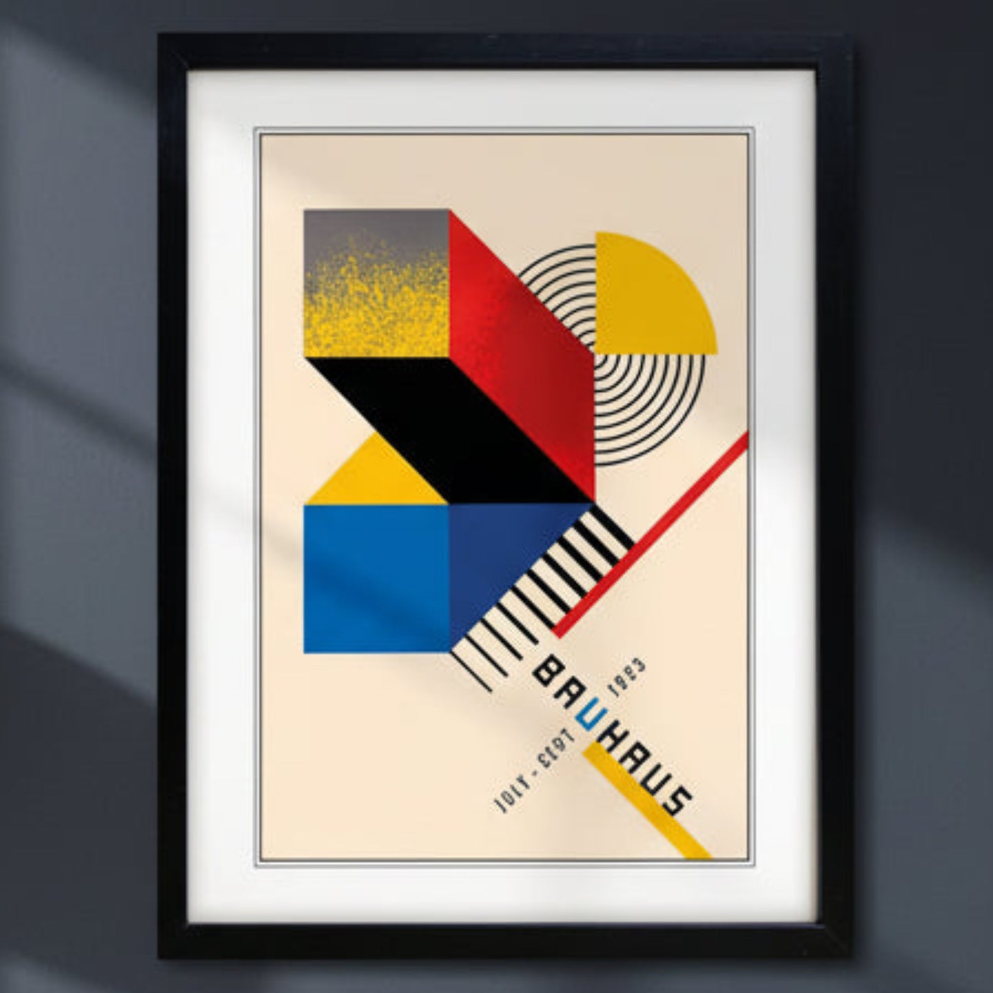 Framed Bauhaus art print featuring a geometric abstract design in red, yellow, blue, black, and beige, with the text 'BAUHAUS' and dates '1913 - 1929' in a minimalist style.