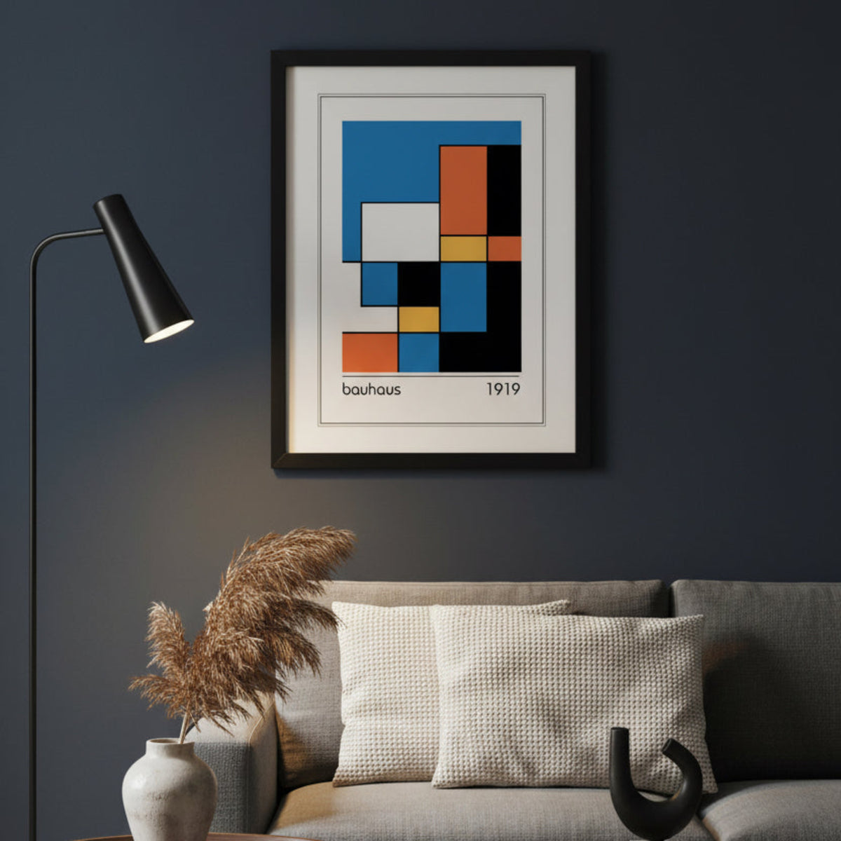 Framed Bauhaus 1919 abstract geometric art print featuring a grid of blue, orange, yellow, black, and white blocks, presented in a black frame with a white mat.