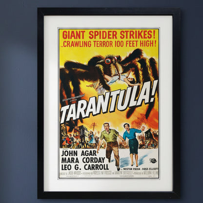 A framed vintage movie poster for the film 'Tarantula!' with a black frame and white mat, showing a dramatic illustration of a giant spider and the title in bold white letters.