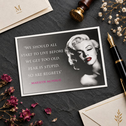 A quote poster featuring Marilyn Monroe on the right in black-and-white with red lips, next to the text: “WE SHOULD ALL START TO LIVE BEFORE WE GET TOO OLD. FEAR IS STUPID.