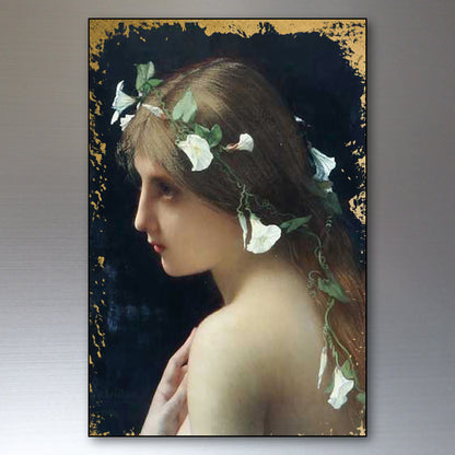 A vertical art print or poster depicting a classical-style portrait of a woman in profile with white flowers and green leaves in her hair, set against a dark background with distressed gold borders. The print is shown hanging on a neutral gray wall.