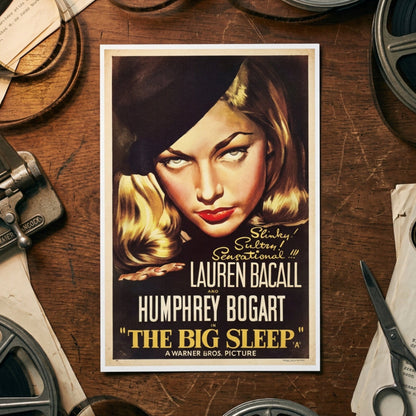A vertical movie poster for 'The Big Sleep' featuring a stylized portrait of Lauren Bacall and Humphrey Bogart, with bold white and yellow text on a dark background, shown against a neutral gray gradient backdrop.