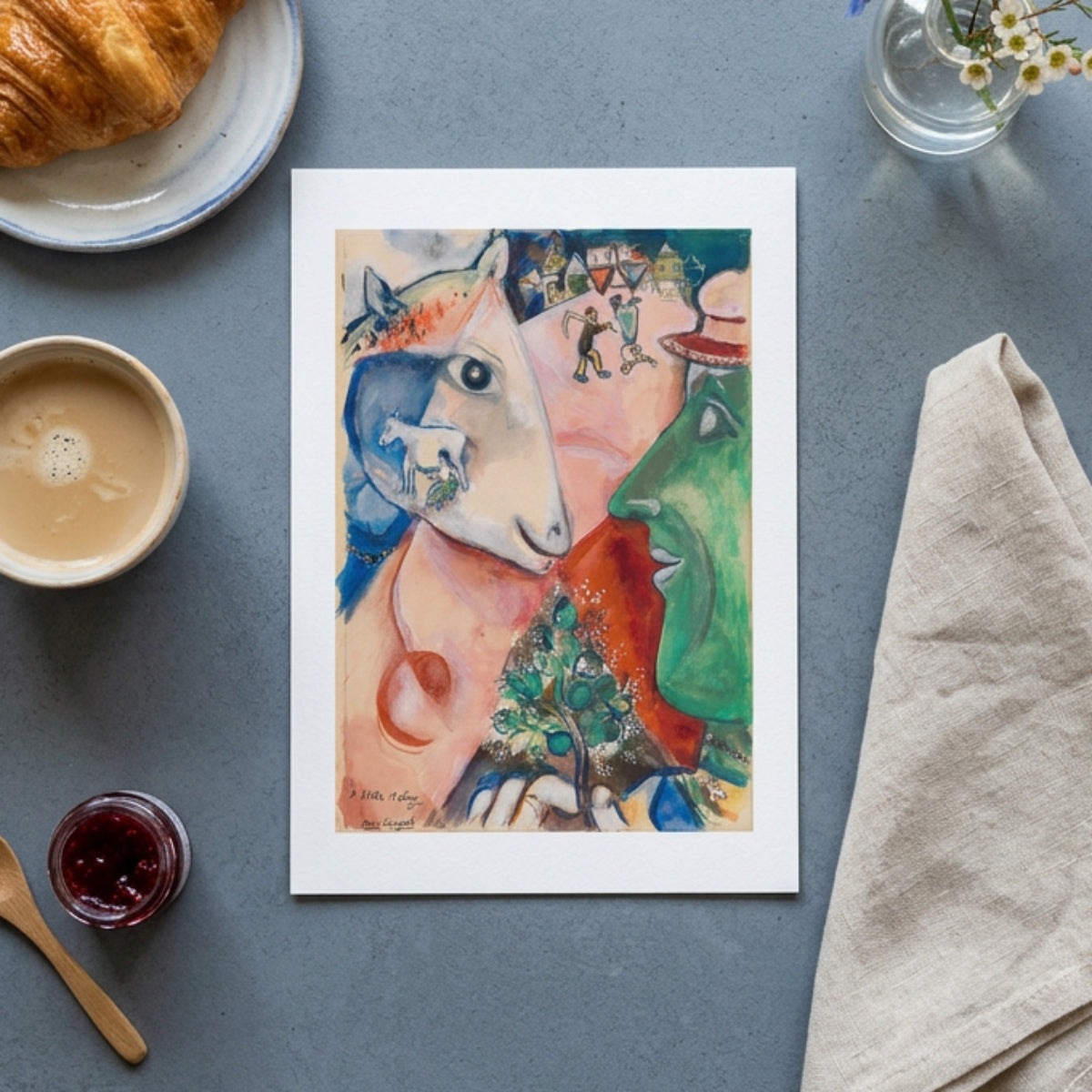 A framed abstract art print featuring a stylized face and horse in expressive watercolor-like colors, displayed against a neutral gray background.