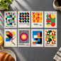 Six framed Bauhaus-style poster prints arranged in a 2x3 grid on a white background. Each print features bold geometric shapes, stripes, circles, and blocks in multiple colors, with the word Bauhaus prominently visible on several posters.