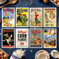 A set of vintage-style illustrated recipe cards arranged on a dark blue table with eggs, a wooden spoon, a whisk, and flour bags around them. The cards feature retro advertisements for Ty.