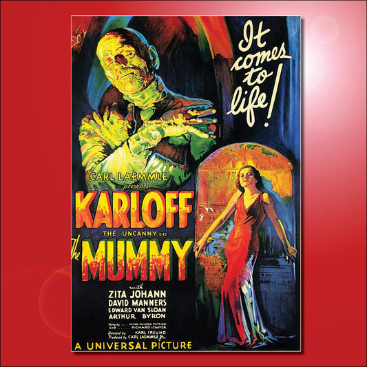 Vintage movie poster for 'The Mummy' starring Karlloff, featuring a greenish mummy and a woman in a red dress, shown centered on a red background.