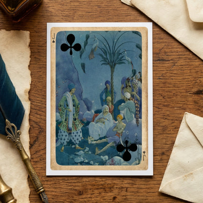 A Jack of Clubs playing card featuring an ornate, vintage-style illustration with figures, a palm tree, and birds in a blue-toned scene, bordered by a textured beige frame and set against a neutral gray gradient background.