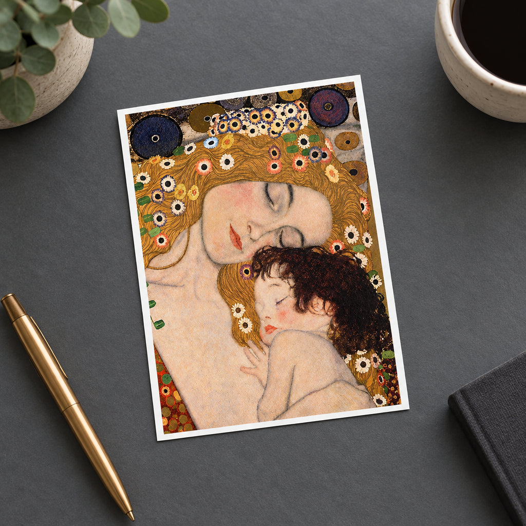 A close-up of a painting depicting a sleeping woman cradling a child, rendered in Gustav Klimt's characteristic decorative style with floral patterns, organic shapes, and warm gold, beige, pink, and brown tones.
