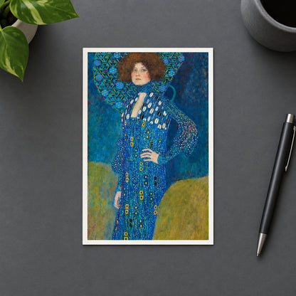 An impressionist-style portrait painting of a woman in a long blue patterned dress and matching hat, rendered with expressive brushstrokes in blue, green, yellow, and brown tones.