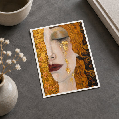 An expressive close-up portrait painting of a woman's face in profile, rendered in warm gold, beige, brown, and black tones with metallic-looking gold details and flowing hair.