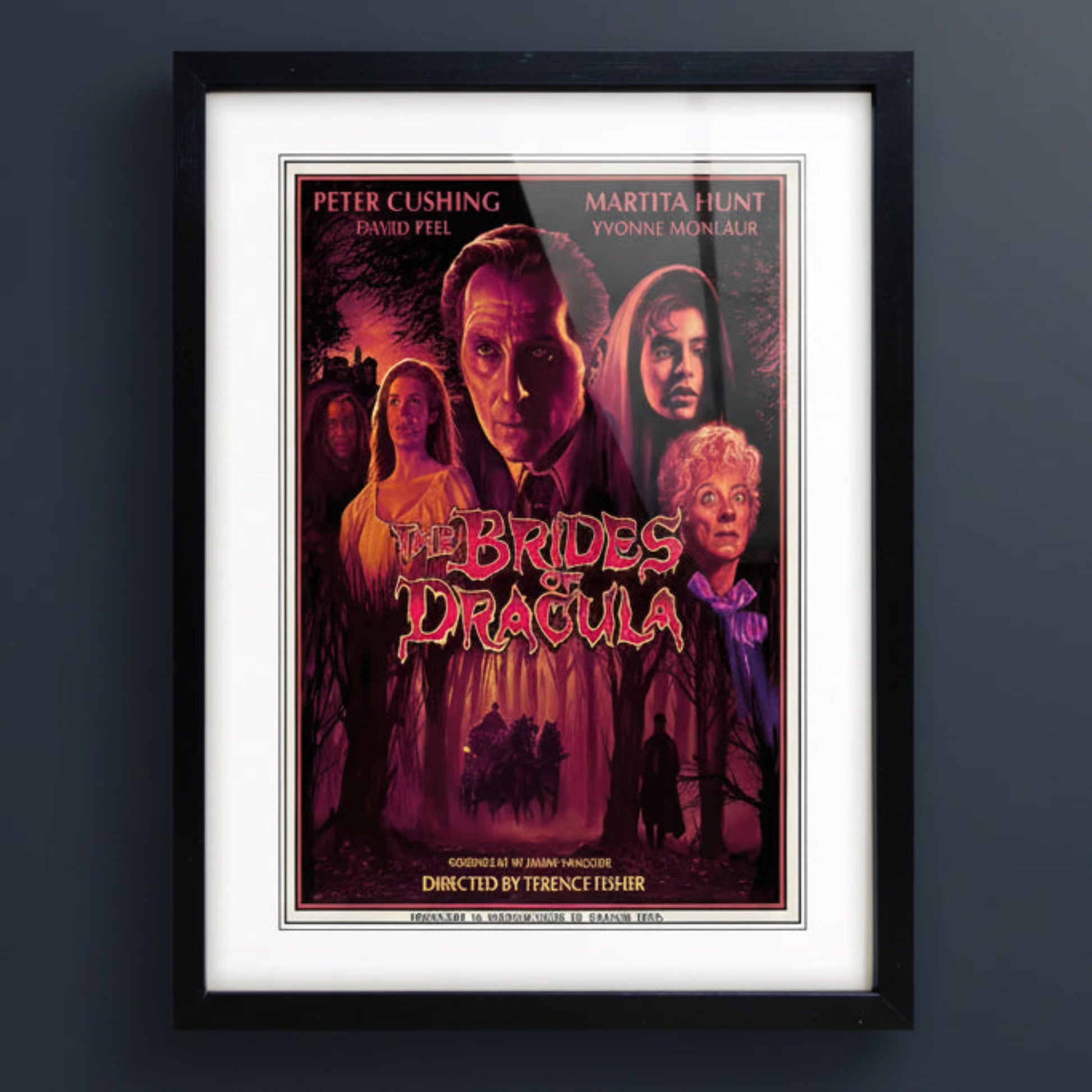 A framed movie poster for 'The Brides of Dracula' featuring Peter Cushing, Martita Hunt, and Yvonne Monnaux, with a black frame and white matting.