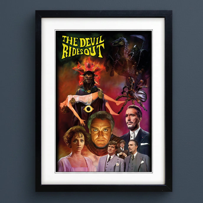 A framed art print of the movie poster 'The Devil Rides Out' featuring a black frame, white mat, and a colorful retro-style poster with yellow title text and illustrated characters.
