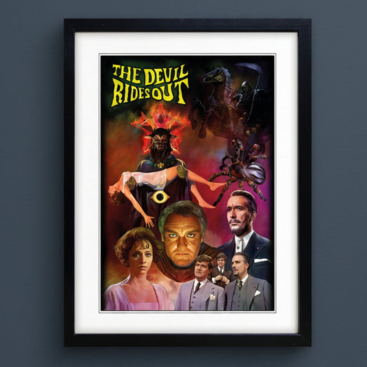 A framed art print of the movie poster 'The Devil Rides Out' featuring a black frame, white mat, and a colorful retro-style poster with yellow title text and illustrated characters.